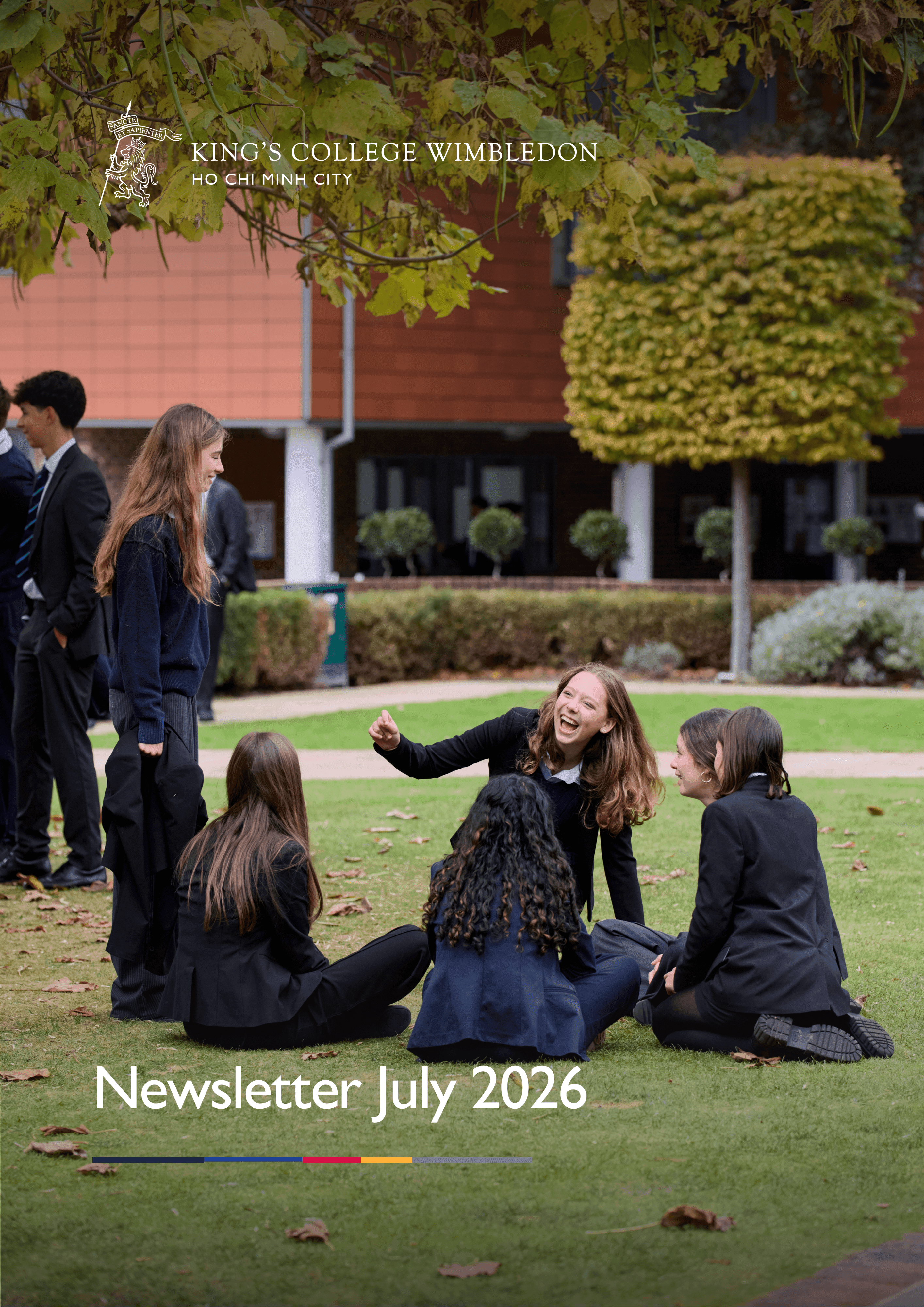 Students in uniform interact and laugh on a green school lawn, featuring 'Newsletter July 2026' text.