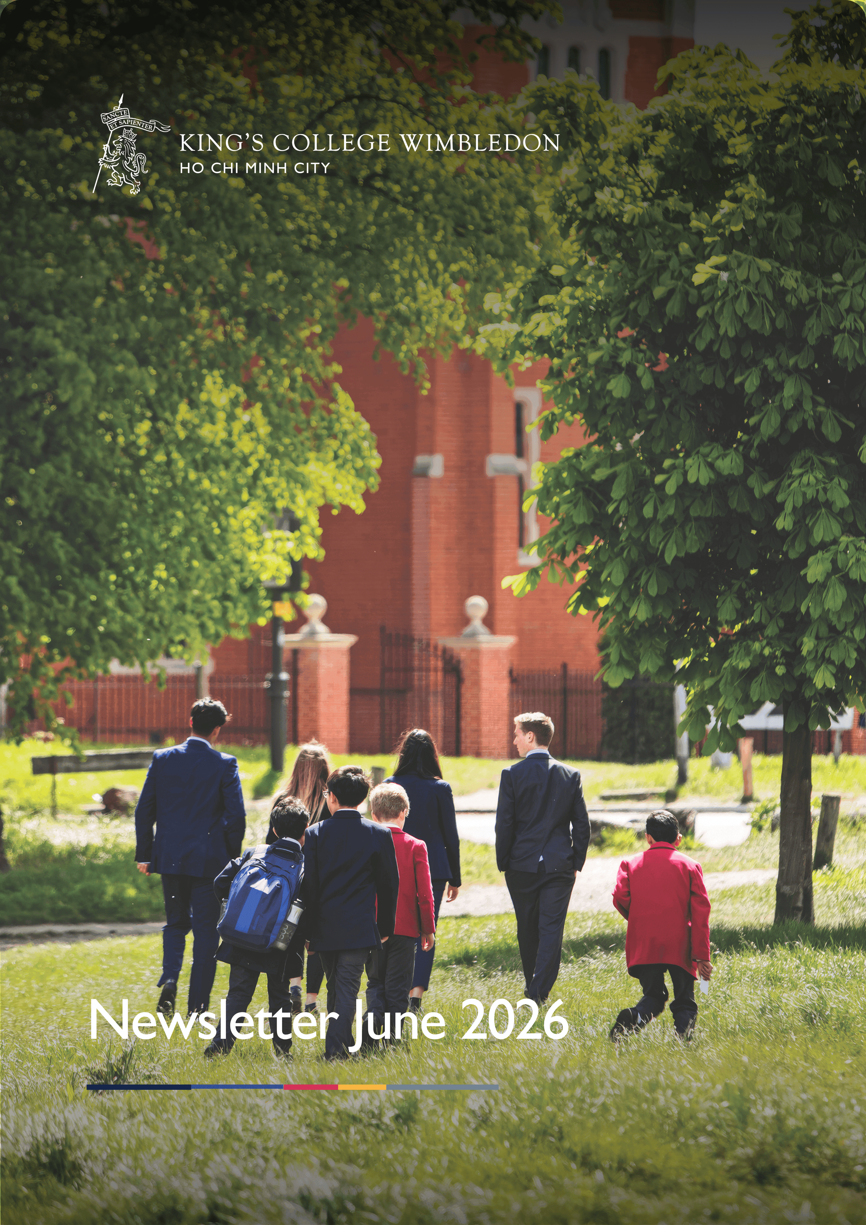 Students and adults walk towards a brick building on a sunny campus. Newsletter June 2026.
