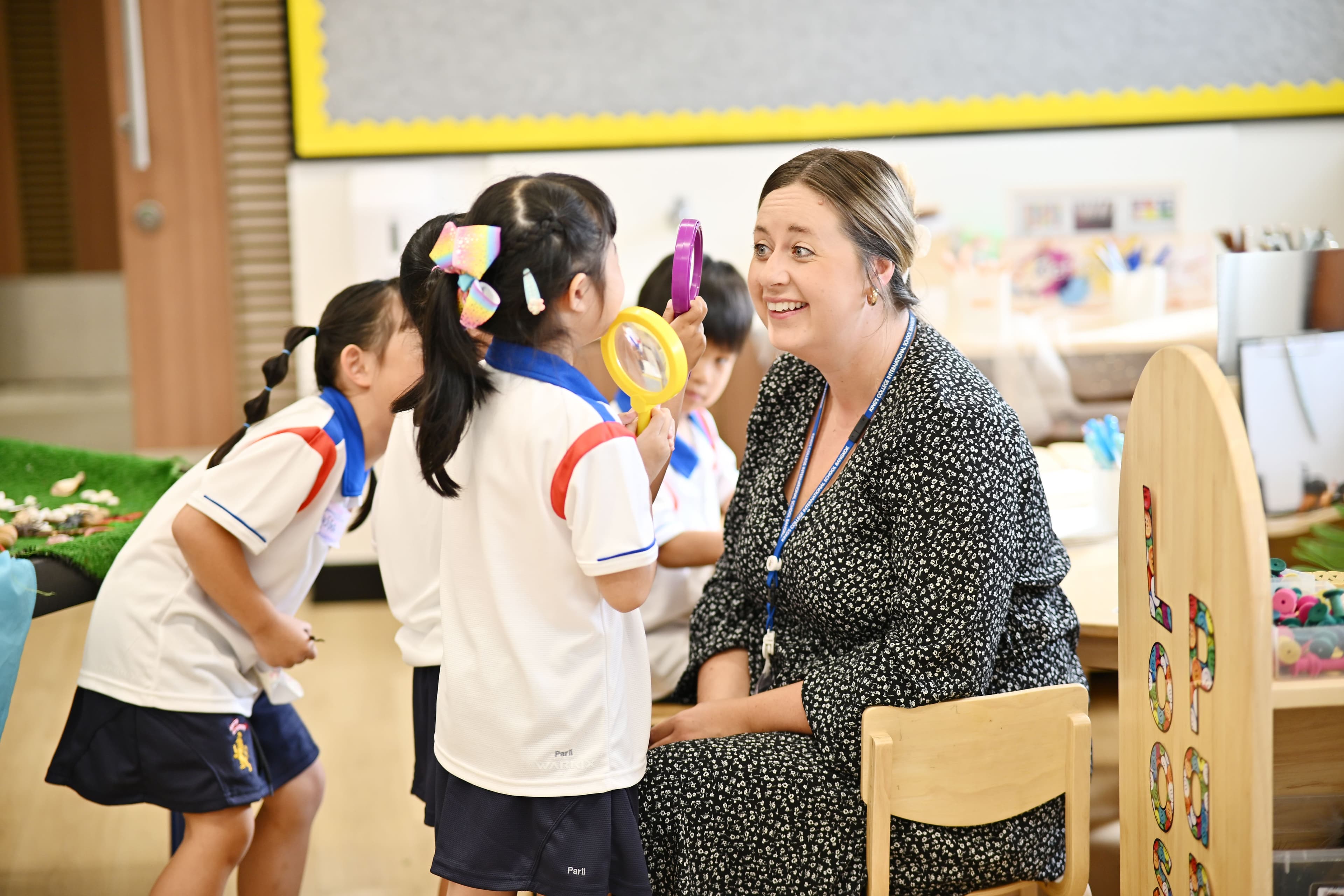 EYFS teachers at King's College Wimbledon HCMC interacting with children during discovery learning 
